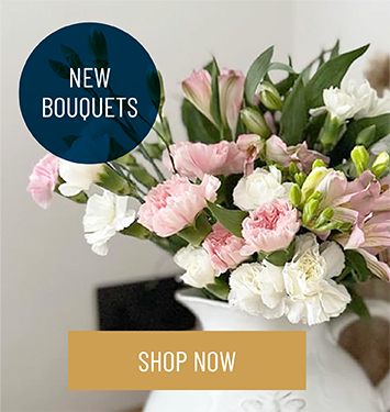 Jug of pink and white flowers to promote new bouquets